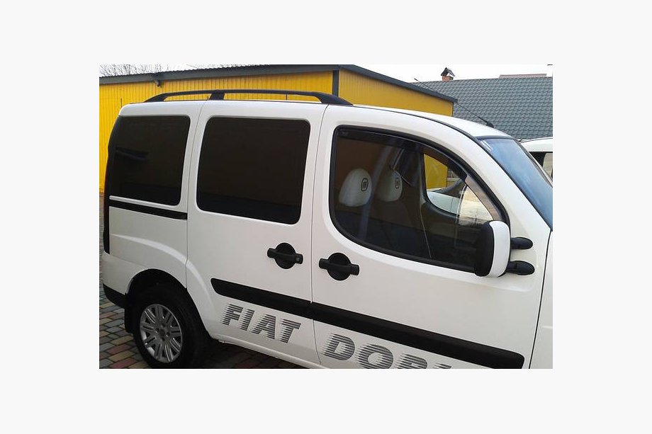 Fiat Doblo I 2005-2010 Barras de Techo Negras Base estandar, pies metalicos Foto 3