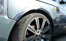 Range Rover III L322 2002-2012 Molduras de aleta de acero inoxidable (4 uds) foto 1