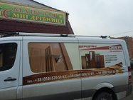 Mercedes Sprinter W906 2006–2018 Barras de techo Shark (pies negros) foto 2