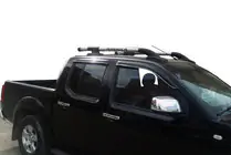 Nissan Navara 2006-2015 Barras de techo con travesaños (2 uds, Cromo) foto 2