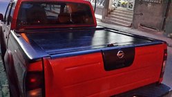 Nissan NP300 1999-2015 Tapa Enrollable foto 1