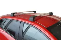 Mazda CX-3 2015- Barras de techo para puntos de anclaje originales (2 uds, con llave) foto 1