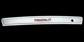 Mazda 6 2003-2008 Moldura cromada con iluminacion roja (plastico) foto 1