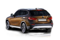 BMW X1 E84 2009-2015 Moldura de acero inoxidable sobre la matrícula foto 1