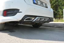 Honda Civic Sedan X 2016-2021 Difusor para parachoques trasero (Meliset, en color) foto 1