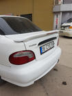 Hyundai Accent 1994-1999 Alerón Meliset (imprimado para pintar) foto 1