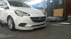 Opel Corsa E 2015-2019 Labio delantero inferior (imprimado) foto 1