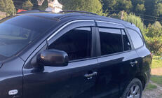Hyundai Santa Fe 2 2006-2012 Deflectores de ventana con moldura cromada (4 uds, Niken) foto 1