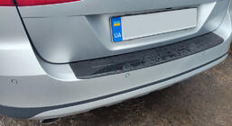 Volkswagen Passat B7 2012-2015 Cubierta de parachoques trasero Esa (SW, ABS) foto 1