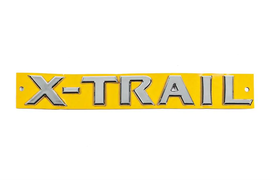 Nissan X-trail T30 2002-2007 Emblema X-Trail 848951DA0B (214mm x 28mm) Image