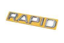 Skoda Rapid 2012-2019 Emblema Rapid (130 mm x 22 mm) foto 2