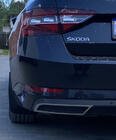 Skoda Superb 2015-2024 Molduras de extremo de parachoques trasero Carmos (3 uds, acero inoxidable) foto 2