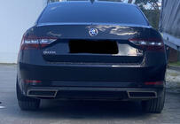 Skoda Superb 2015-2024 Molduras de extremo de parachoques trasero Carmos (3 uds, acero inoxidable) foto 3