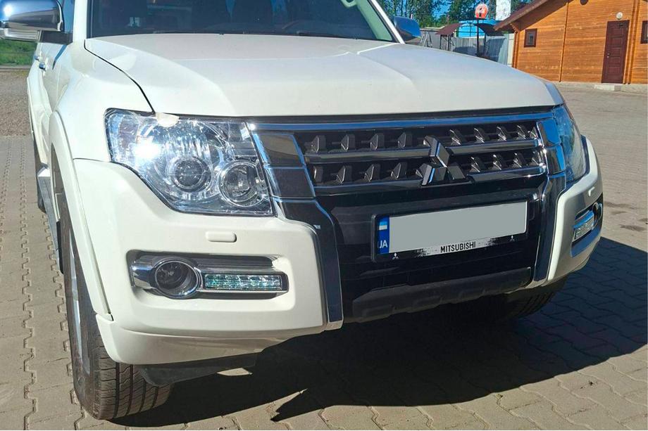 Mitsubishi Pajero Wagon IV 2006-2021 Faros Delanteros OEM (2 uds) Image
