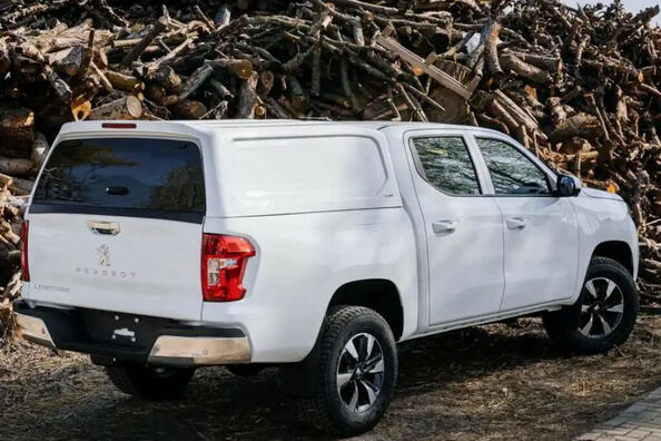 Cómo cerrar la carrocería de una camioneta: soluciones confiables para la protección de la carga Foto 1