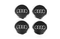 Audi Tapacubos centrales 57/61 mm con aro (4 uds, negro) foto 1