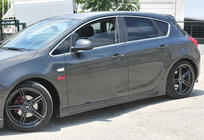 Opel Astra J 2009-2015 Faldones Laterales DPT V-3 (Imprimados para Pintar) foto 1
