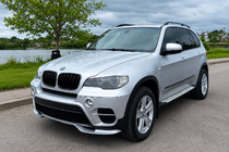 BMW X5 E70 2007-2013 Labio de parachoques delantero (2010-2013, imprimado para pintar) foto 1