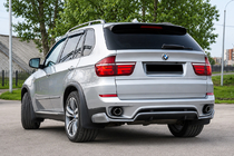 BMW X5 E70 2007-2013 Cubierta de parachoques trasero (2010-2013, imprimada para pintar) foto 1