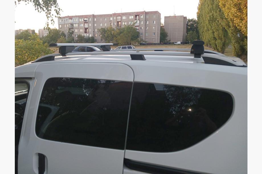 Dacia Dokker 2013-2022 Barras de techo transversales para rieles de techo estándar con llave Wizard V1 (2 uds) Foto 2