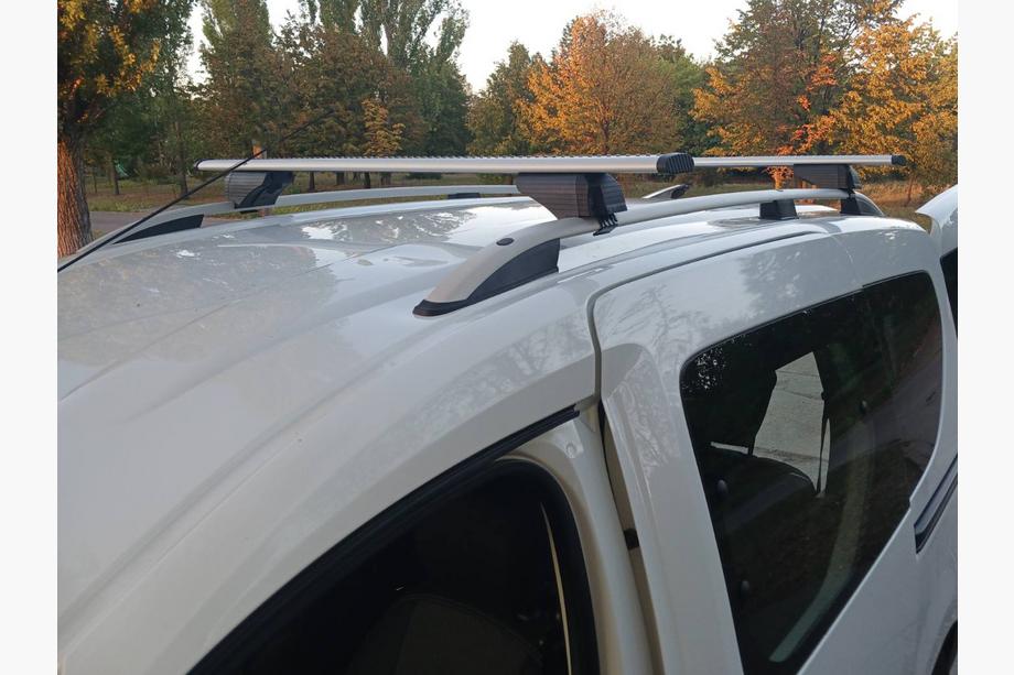 Dacia Dokker 2013-2022 Barras de techo transversales para rieles de techo estándar con llave Wizard V1 (2 uds) Image