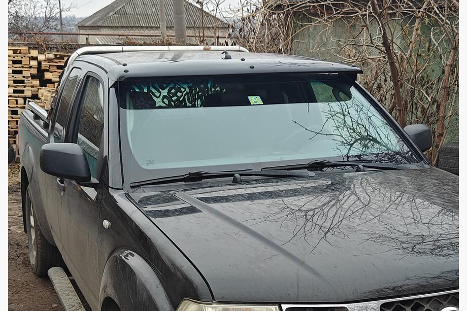 Nissan Navara 2006-2015 Visera para parabrisas (en el marco) Image
