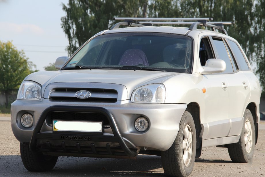 Hyundai Santa Fe 1 2000-2006 Defensa Delantera WT004 Negra (Acero Inoxidable) Image