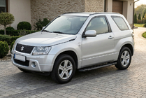 Suzuki Grand Vitara 2005-2017 Estribos Laterales RedLine Black (2 uds., Aluminio) foto 1