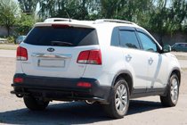 Kia Sorento II XM 2009-2014 Barra Trasera AK003-2 Negra (Acero Inoxidable) foto 1
