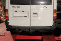 Ford Transit 2000–2014 Estribo trasero de protección AK-Special Black (acero inoxidable) foto 2