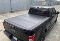 Toyota Hilux 2006-2015 Cubierta de caja de 4 secciones (2011-2015) foto 1