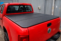 Toyota Hilux 2015- Tapa de caja plegable de 3 secciones (2020-) foto 3