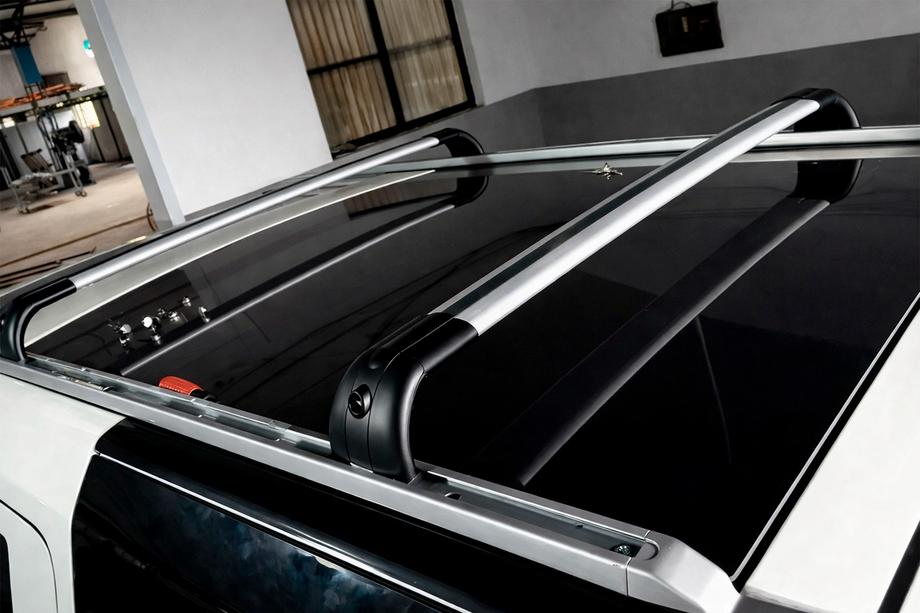 Land Rover Discovery IV 2009-2017 Barras transversales de techo para raíles integrados OEM (2 uds) Gris Foto 1