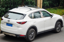 Mazda CX-5 2017–2025 Barras transversales de techo para raíles integrados OEM (2 uds) foto 3