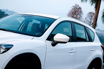 Mazda CX-5 2012-2017 Barras longitudinales de techo integradas OEM (2 uds) foto 4