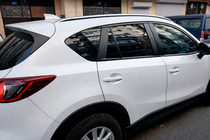 Mazda CX-5 2012-2017 Barras longitudinales de techo integradas OEM (2 uds) foto 3