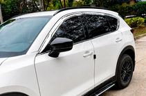 Mazda CX-5 2017–2025 Barras longitudinales de techo integradas OEM (2 uds) foto 2