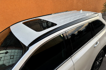 Toyota Highlander 2013-2019 Raíles de techo integrados negros OEM (plástico ABS) foto 1