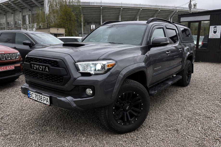 Toyota Tacoma 2015–2023 Barras longitudinales de techo OEM negras (aluminio) Image