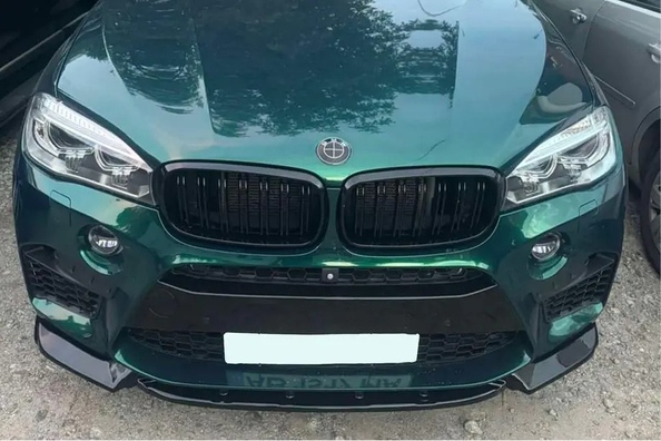 Tuning del BMW X5 F15: carcasas de espejo, spoiler y lip delantero Foto 2