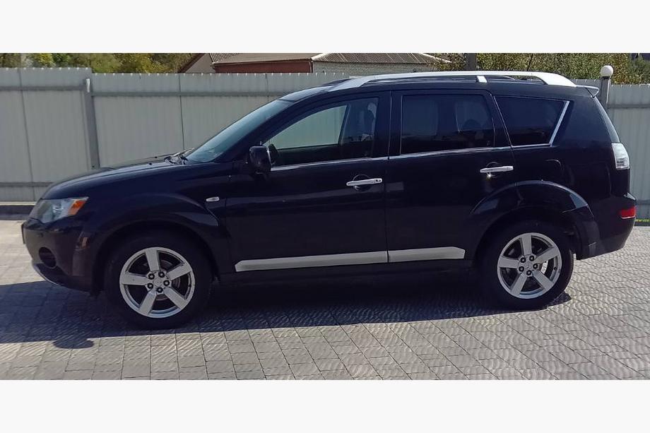 Mitsubishi Outlander 2006-2012 Molduras de ventanas acero inoxidable (8 uds) Image