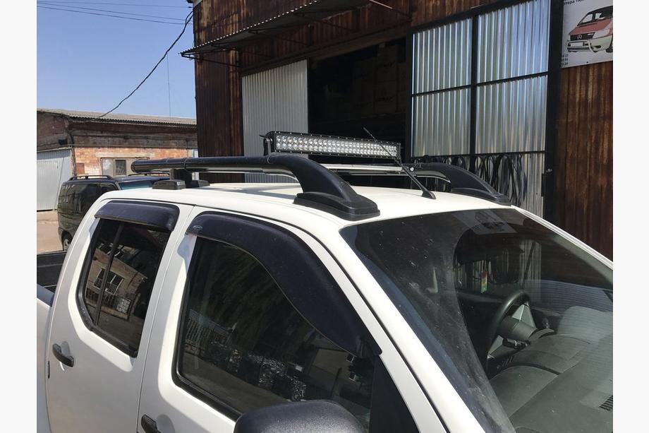 Nissan Navara 2006-2015 Barras de techo con travesaños (2 uds., Negro) Foto 3