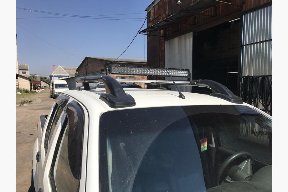 Nissan Navara 2006-2015 Barras de techo con travesaños (2 uds., Negro) Foto 4