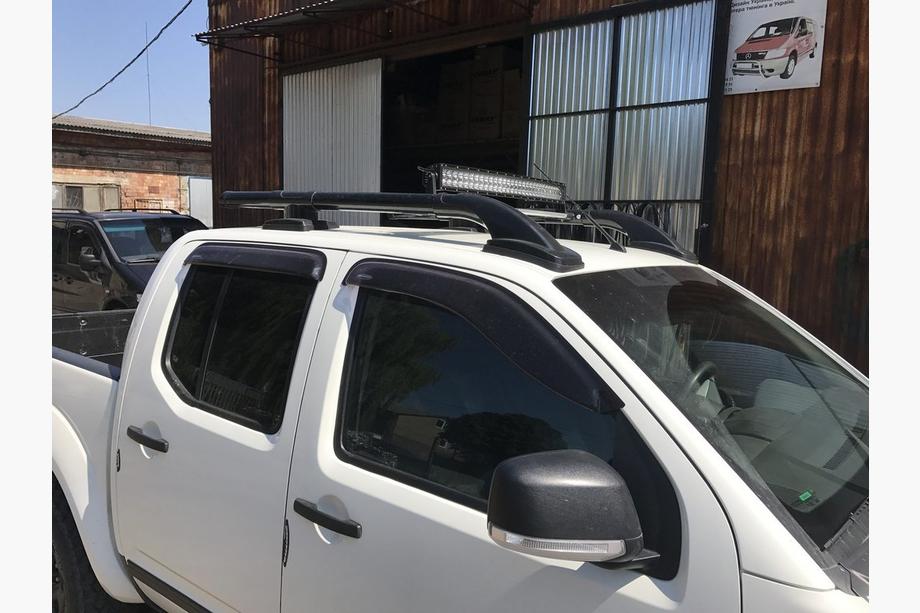 Nissan Navara 2006-2015 Barras de techo con travesaños (2 uds., Negro) Foto 5