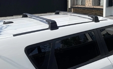Fiat Doblo I 2005-2010 Barras de techo (travesaños) para puntos de anclaje originales con cerradura (2 uds) foto 1