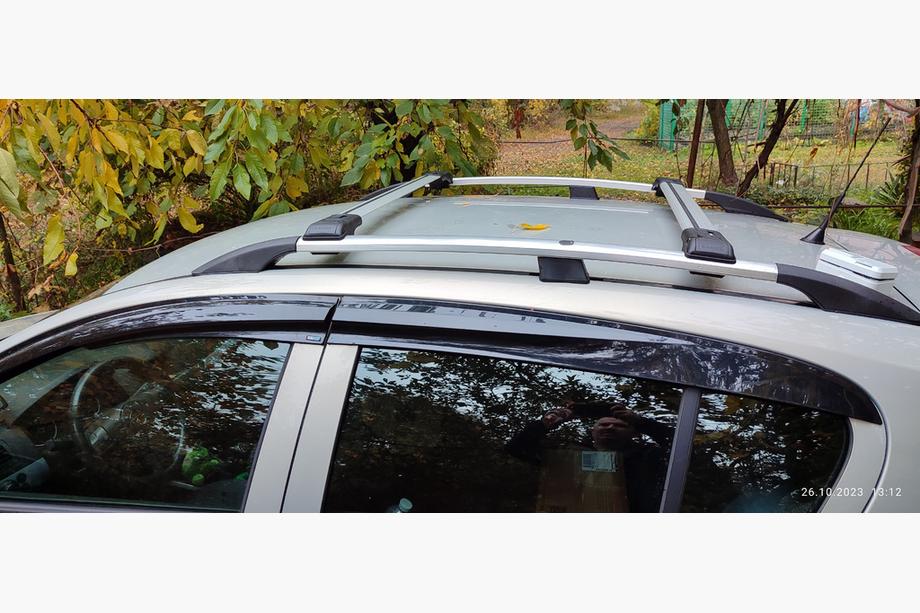 Opel Astra H 2004-2013 Barras de techo para rieles estándar con llave (2 uds) Image