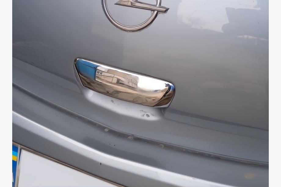 Opel Corsa D 2007-2014 Cubierta de manija de puerta trasera en acero inoxidable OmsaLine - Acero Inoxidable Italiano Image