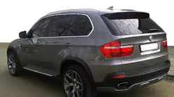 BMW X5 E70 2007-2013 Cubierta de parachoques trasero (2007-2010, imprimada para pintar) foto 1