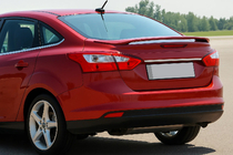 Ford Focus III 2011-2017 Moldura estrecha de acero inoxidable sobre la matrícula Sedán (Cromo) foto 1