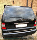 Mercedes ML W163 1997-2005 Moldura cromada sobre la matrícula (acero inoxidable) Plástico Cromado foto 1